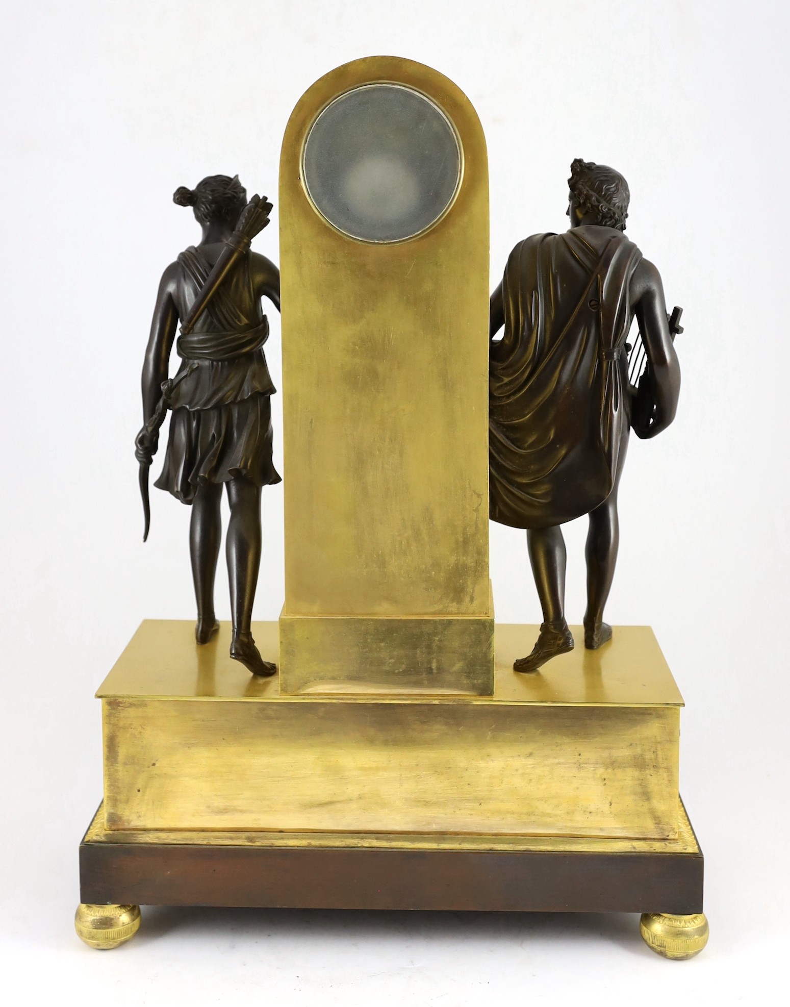 A 19th century French Louis XVI style bronze and ormolu mantel clock, width 42cm height 60cm